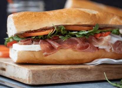 The perfect combo: Toasted Rustic Baguette, Prosciutto, Mozzarella, Arugula, Tomato and Balsamic.