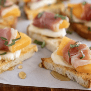 Burrata Prosciutto Melon Crostini