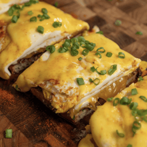 Bacon, Egg & Cheese Garlic Bread with Hollandaise